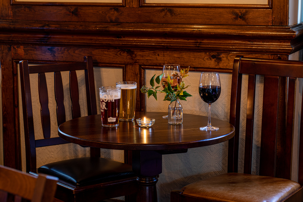 glasses of ale and wine on a table